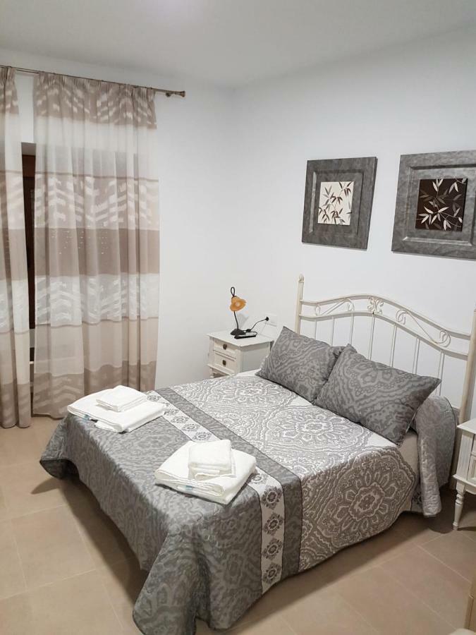 Apartamentos Hela Arjona エクステリア 写真